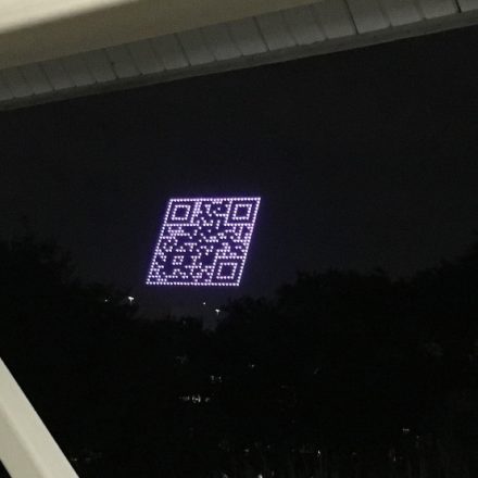 IAAPA 2023 flying drone QR logo